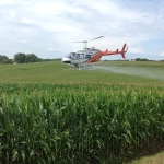 helicopter spraying chemicals